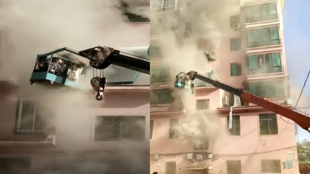 Watch Hero 19 Year Old Crane Operator Saves 14 People From Burning Building Shanghaiist Not
