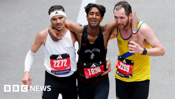 Boston marathon: NI runner helps competitor after collapse